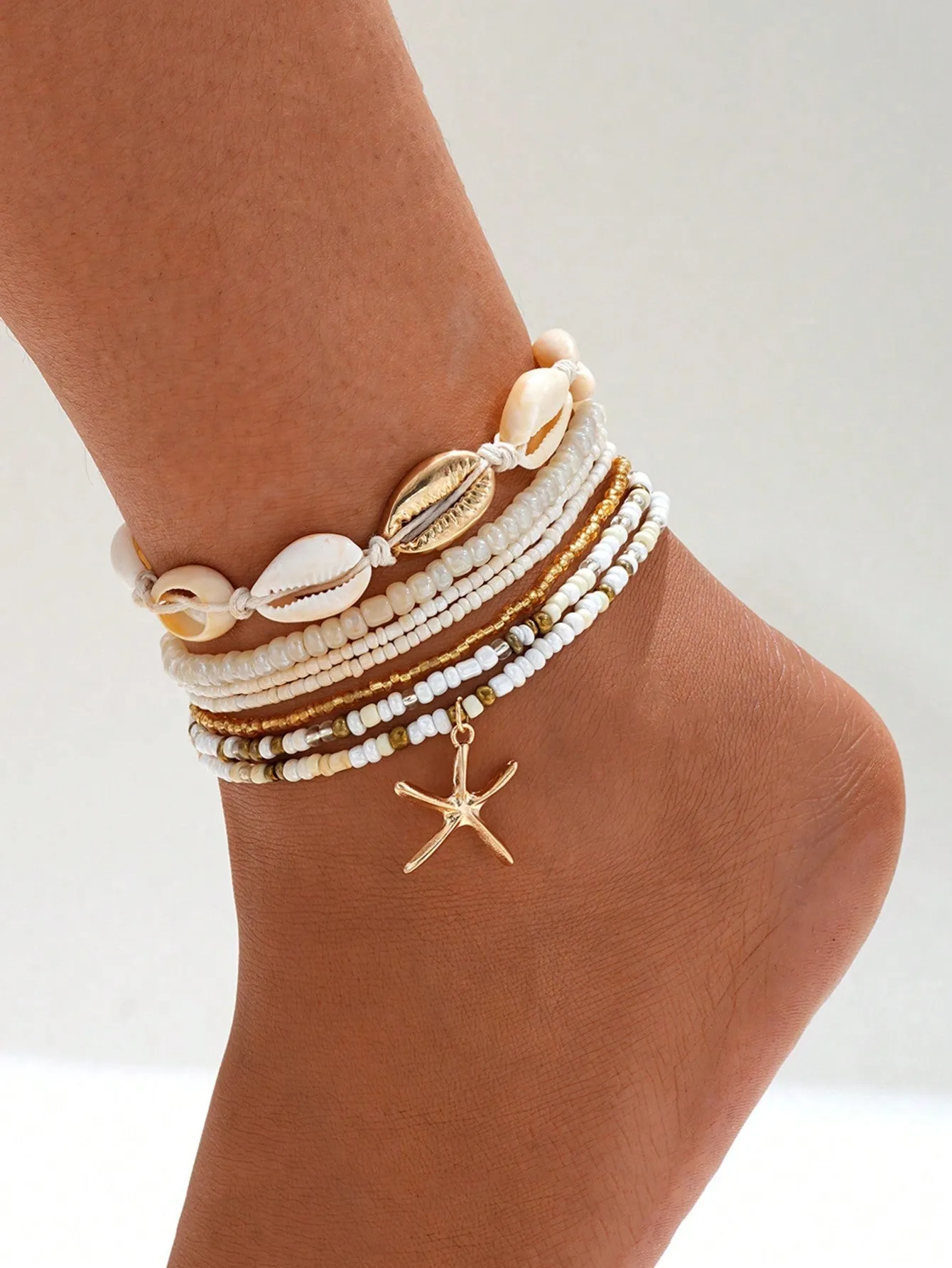7pcs Bohemian Style Beachy Sea Star Bead Elastic Anklet Set
