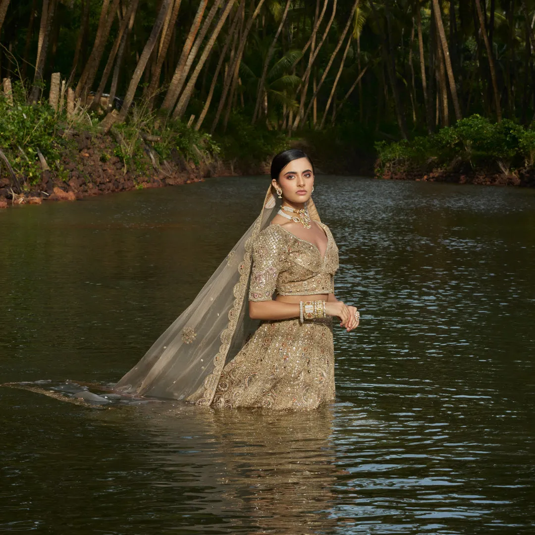 Coveted Matte Gold Lehenga With Self Colour Work