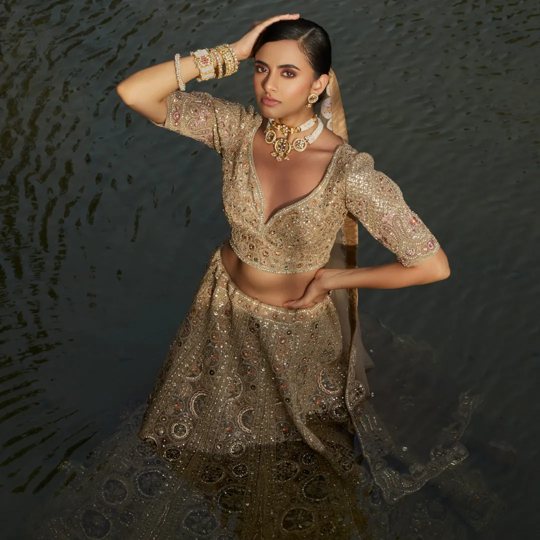 Coveted Matte Gold Lehenga With Self Colour Work