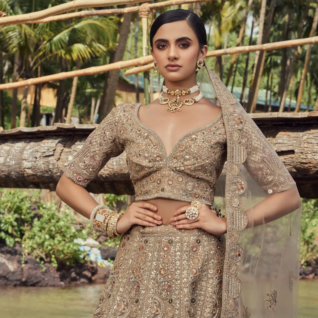 Coveted Matte Gold Lehenga With Self Colour Work