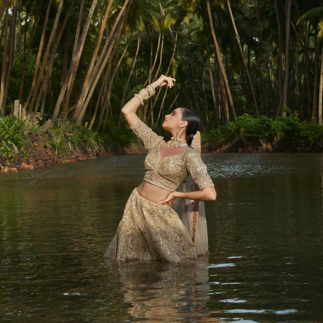 Coveted Matte Gold Lehenga With Self Colour Work
