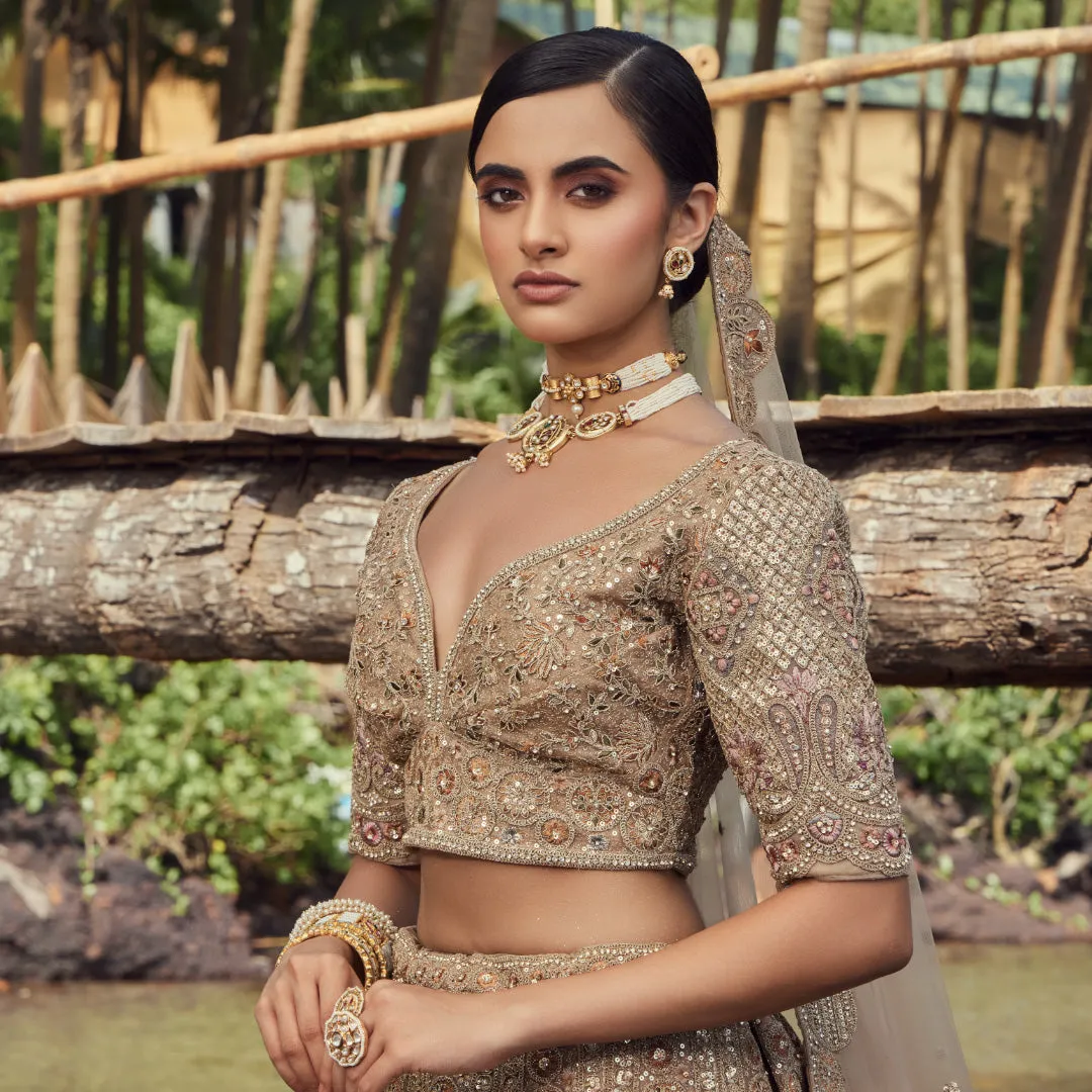 Coveted Matte Gold Lehenga With Self Colour Work