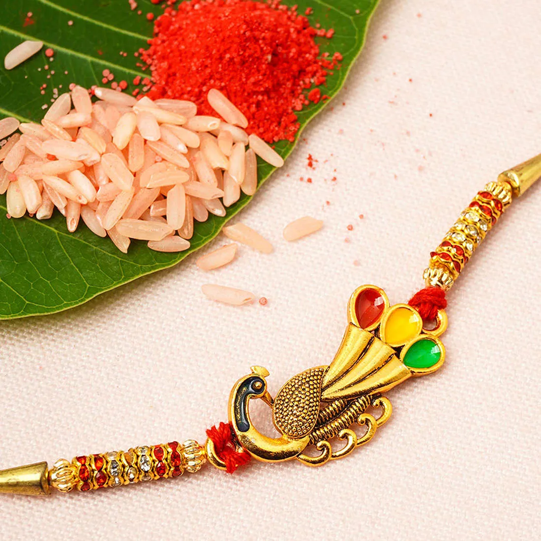 Gold Colorful Feather Peacock Rakhi