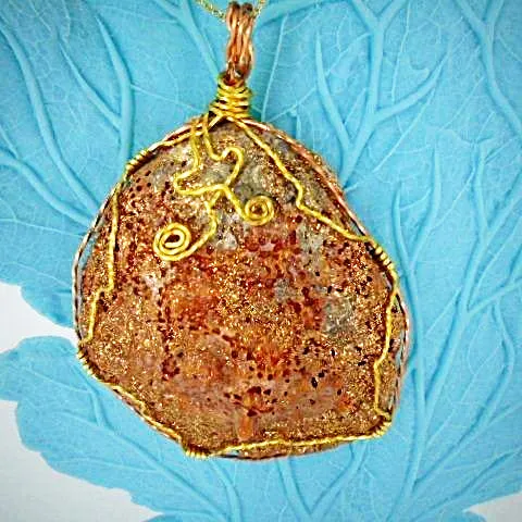 Gorgeous Reddish Clamshell Pendant with Gold Sparkle, Wire Wrap, and Twirls - Handmade Jewelry
