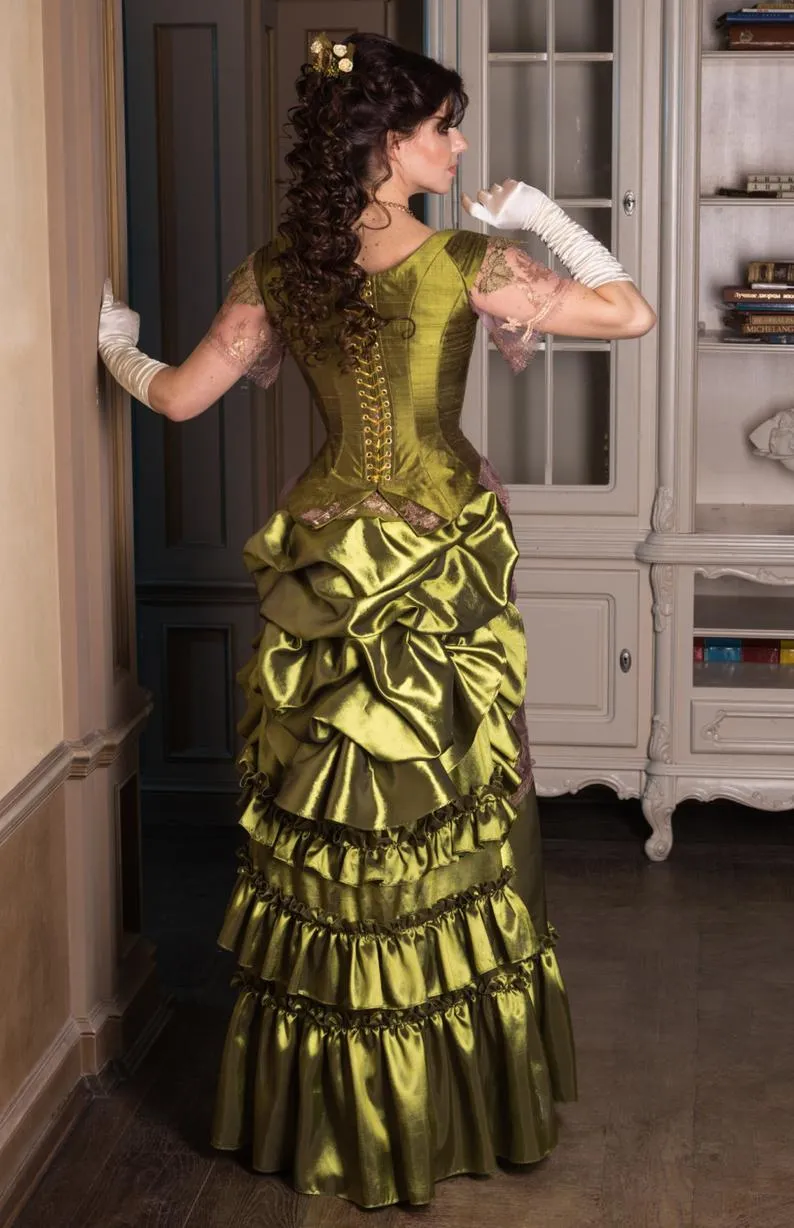Victorian green walking silk costume with laces and metal spiders