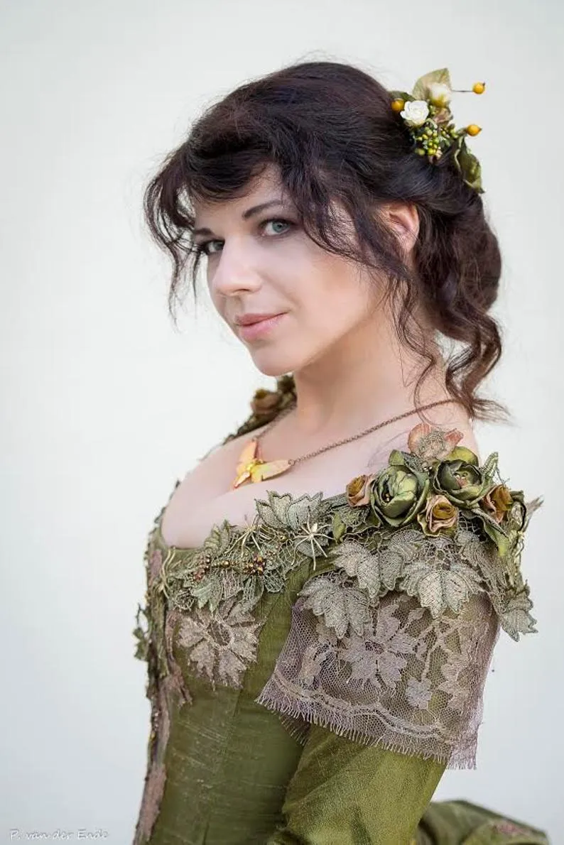 Victorian green walking silk costume with laces and metal spiders