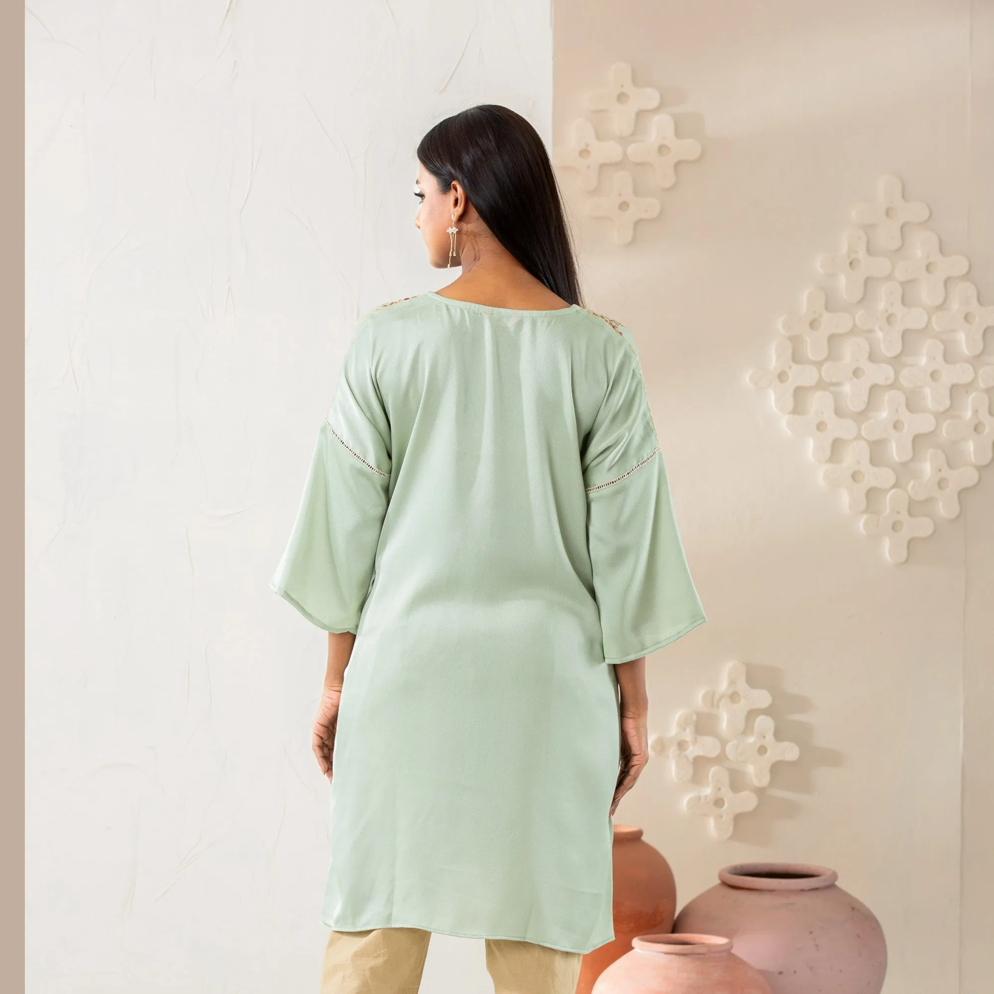 Women Pastel Embroidered Kurti