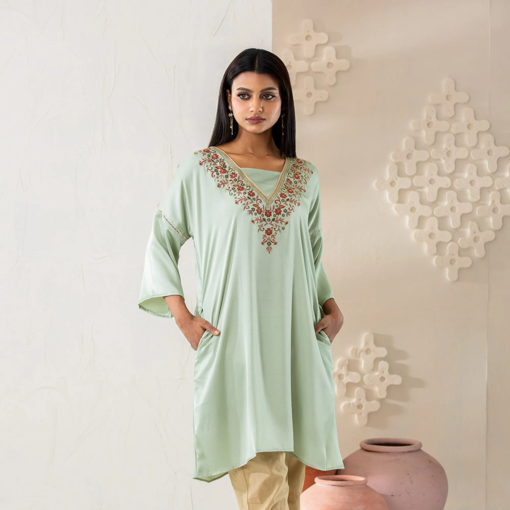Women Pastel Embroidered Kurti