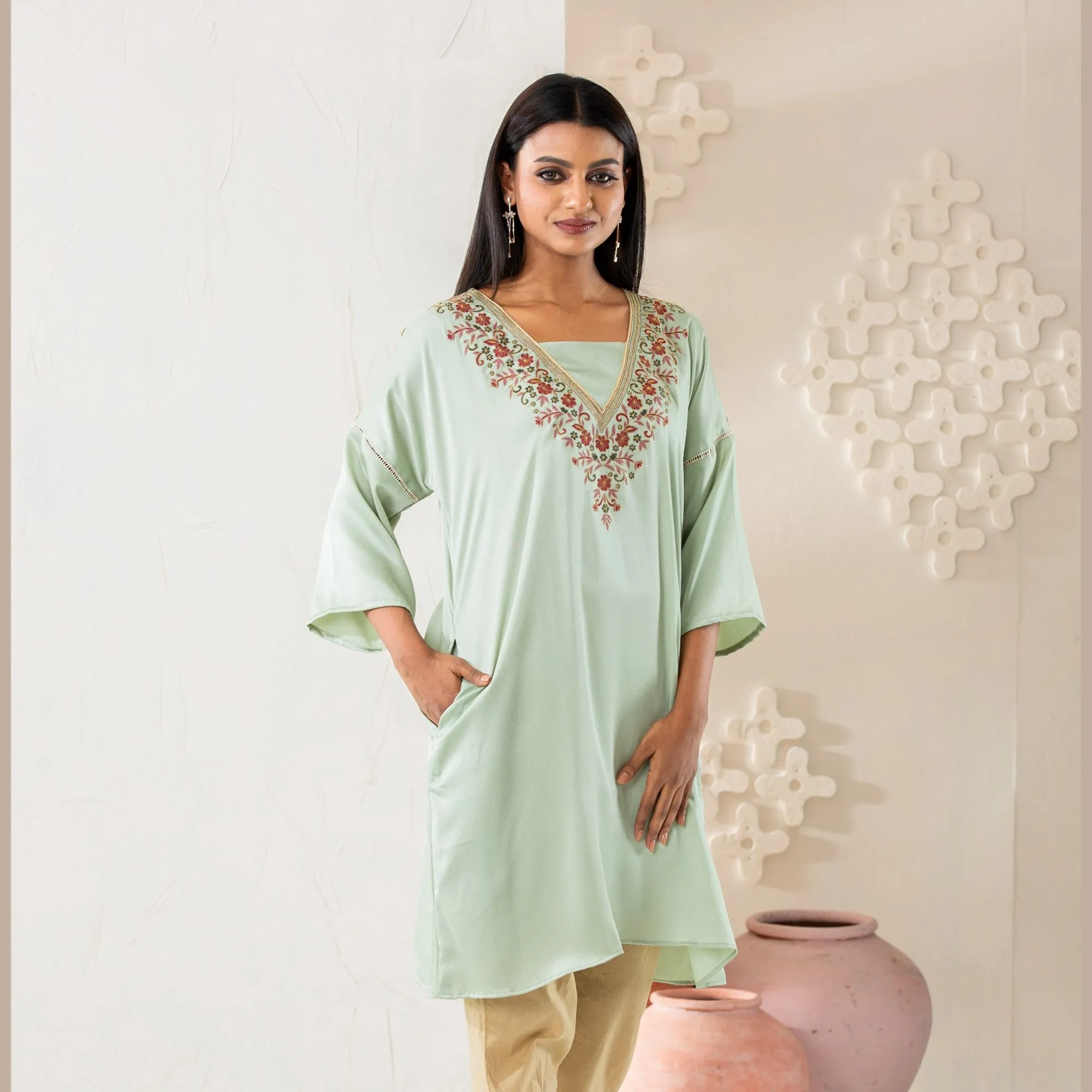Women Pastel Embroidered Kurti