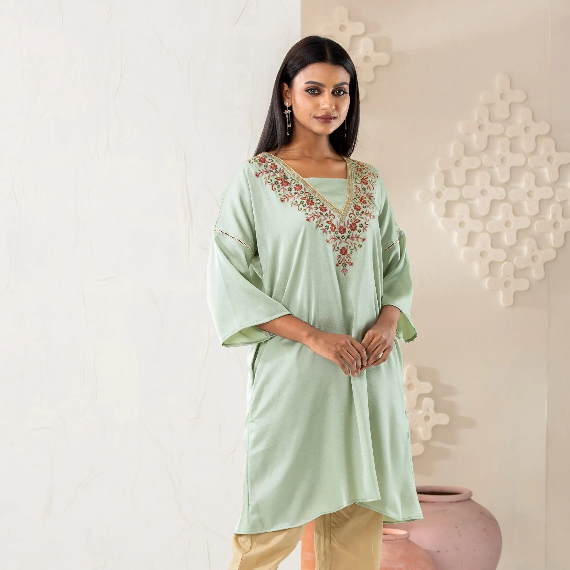 Women Pastel Embroidered Kurti